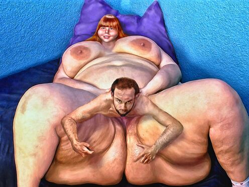 A young unbirth couple relaxing at home